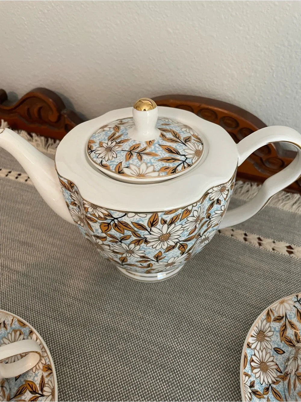 Elegant Floral Porcelain Teapot and Cup Set in Blue and Gold